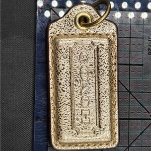 Coach Metallic Gold Tag